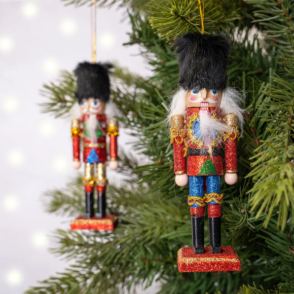 Painted wooden nutcracker with faux fur hat